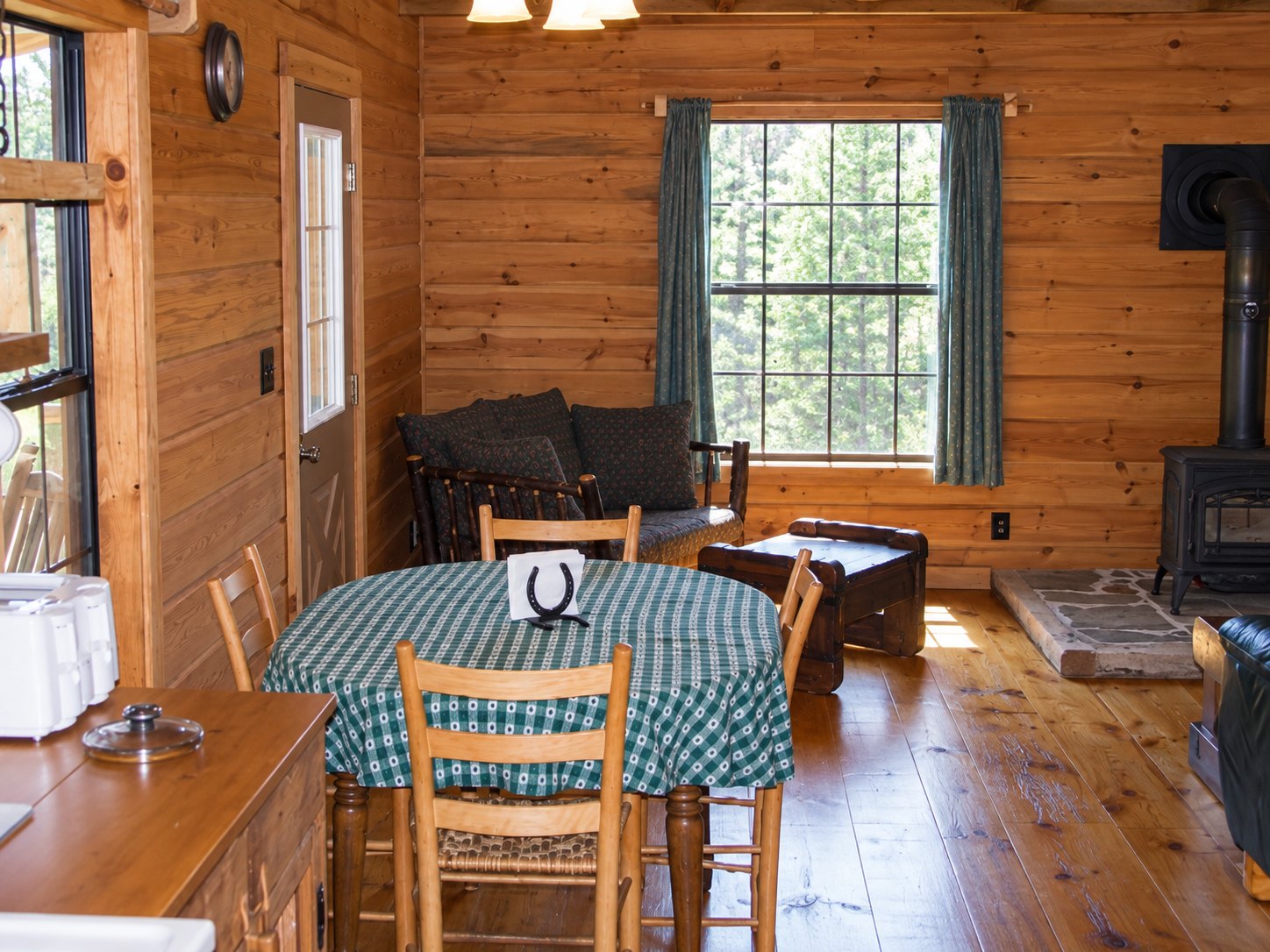 Dining and living area inside Kindling Trail Cabin