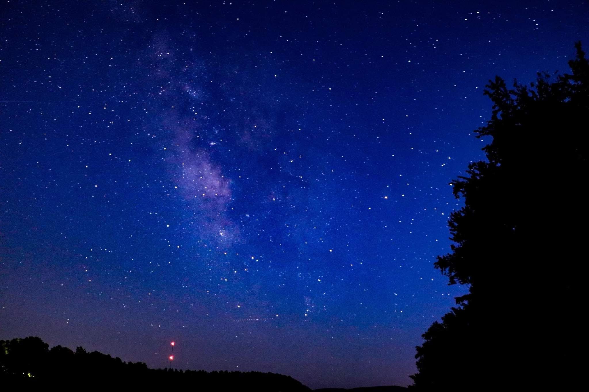 Star-filled night sky and Milky Way near Kindling Trail Cabin